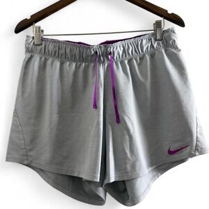 Nike grey running shorts with purple drawstring